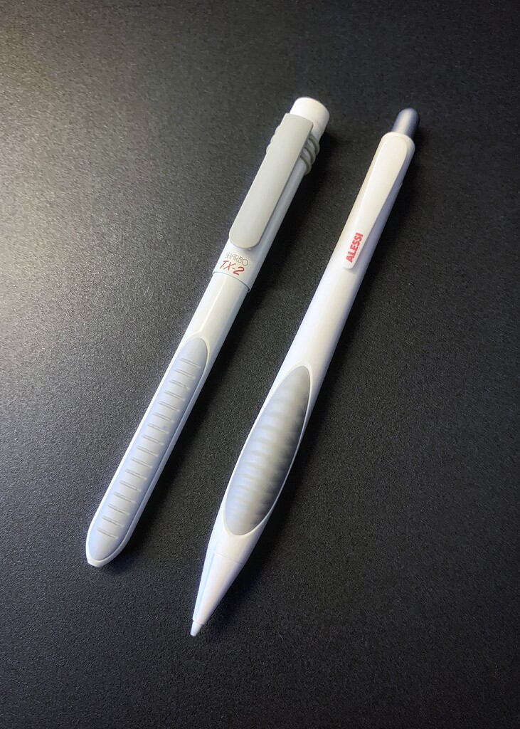 Designer duo in white, grey and red - Collection Photos and Videos